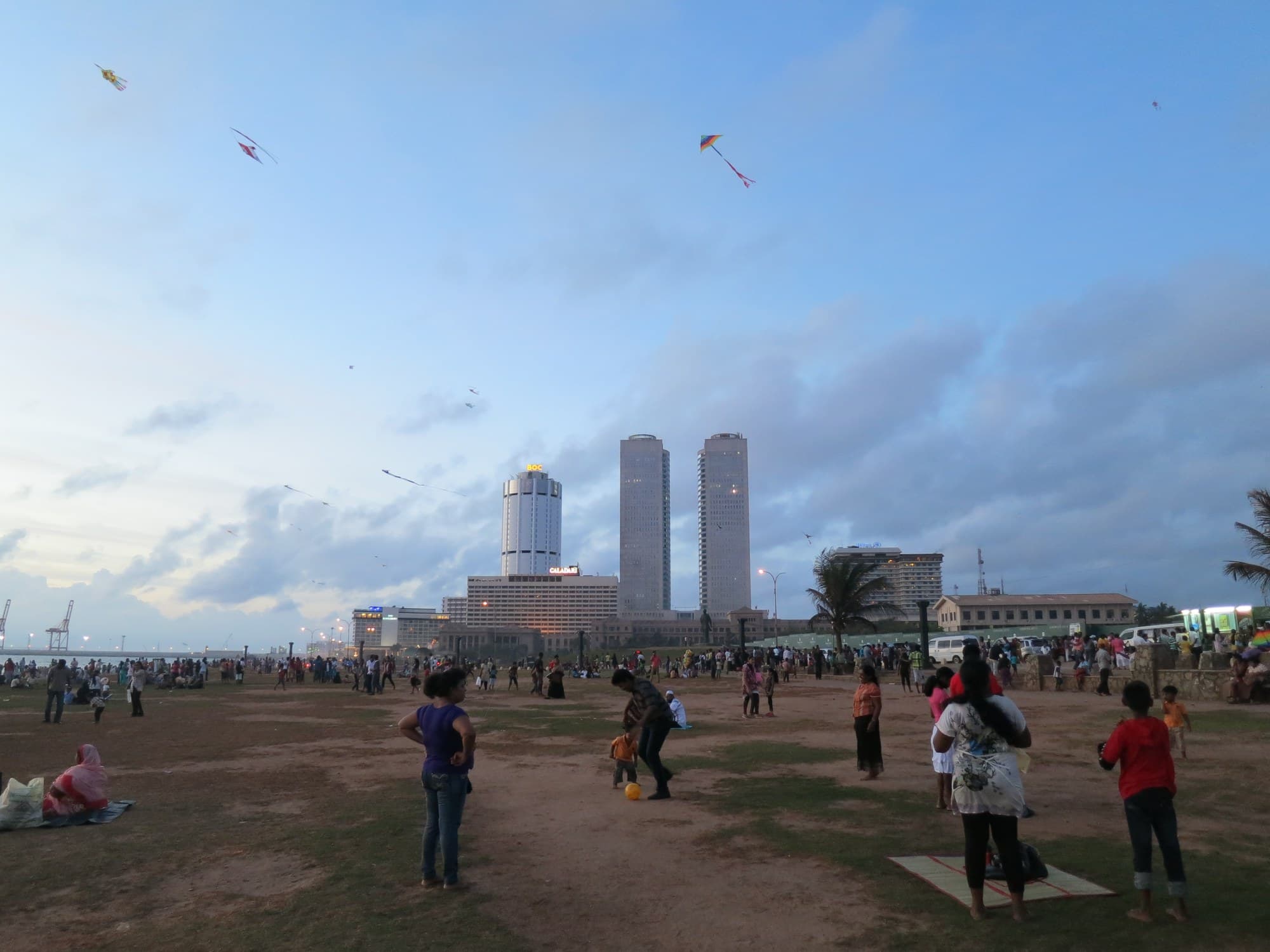 Galle Face Green, Colombo, on a Sunday evening in 2013: kites over the promenade, and the city behind it.