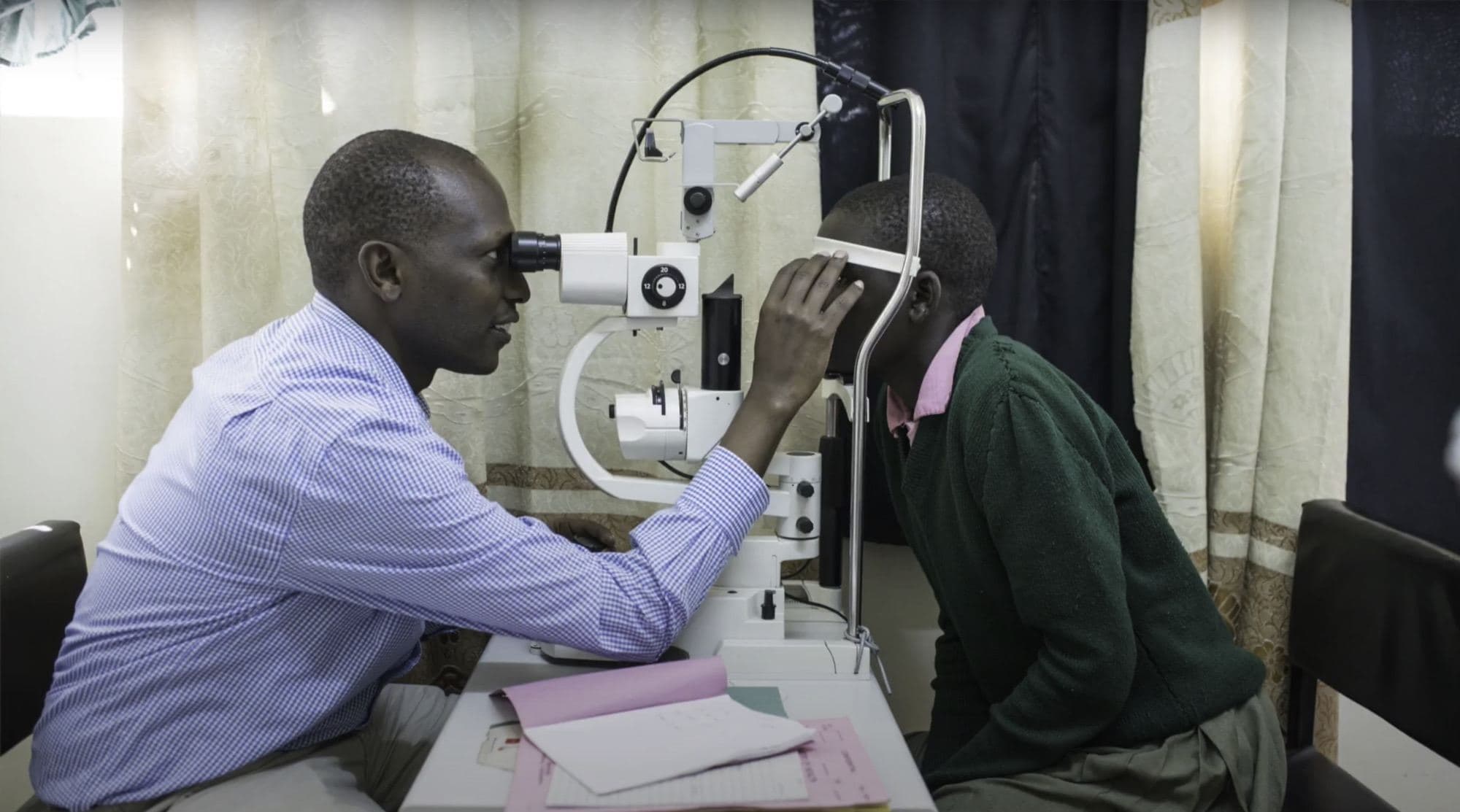An eye examination at the Kitale eye clinic in Kenya, 2021. Not a Lions or a Leo project: it is a photograph of the work SightFirst exists to pay for.